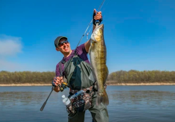 man holding a fish